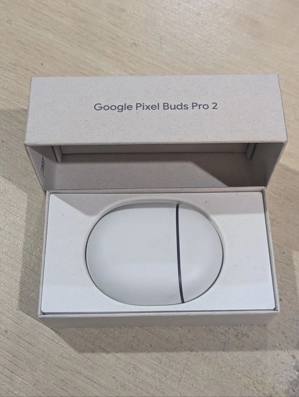 google True Wireless Earbuds with White Charging Case and Gray Earbuds